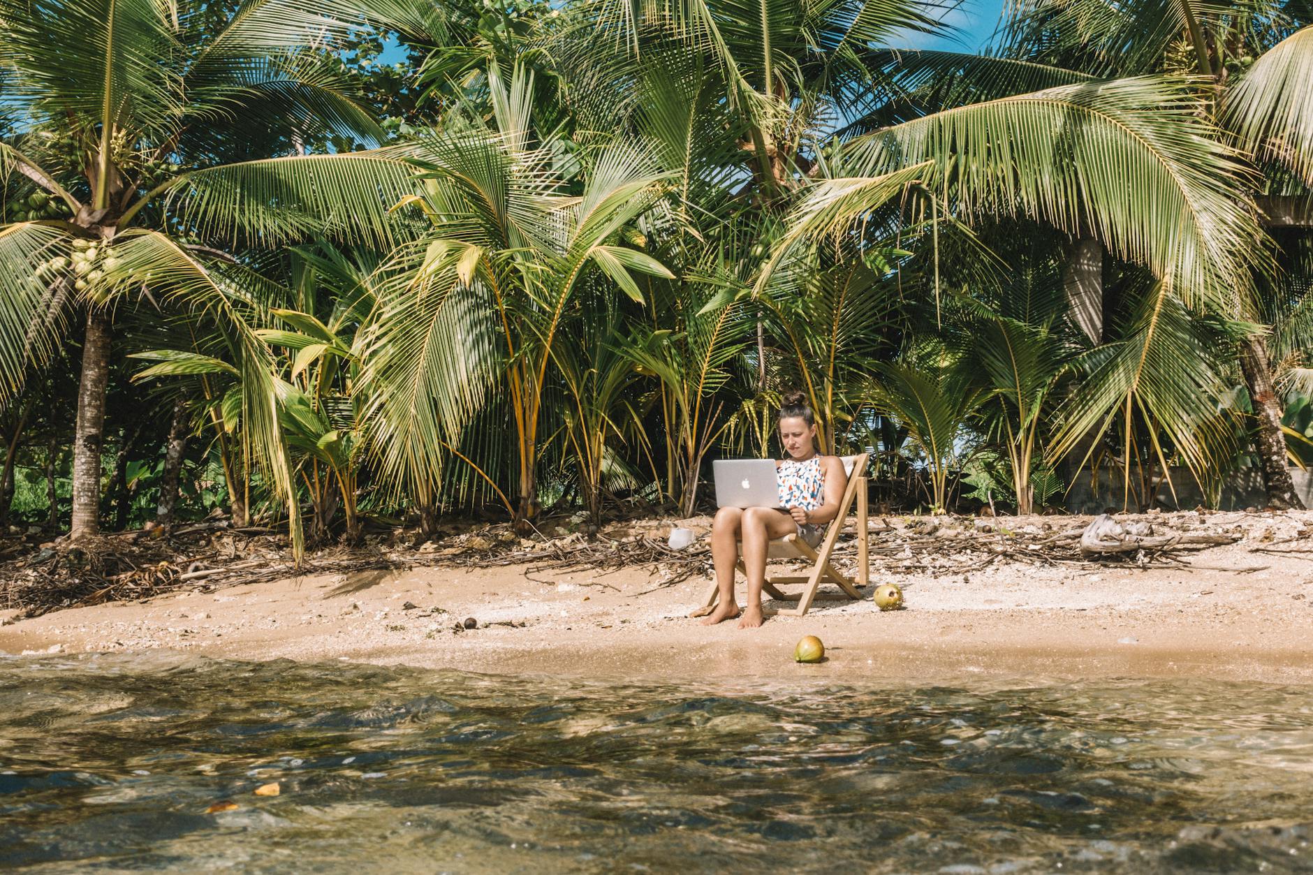 Digital Nomad Working on Beach